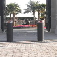 image electromechanical bollards with integrated flashing light installed at a museum to secure the area from possible attacks