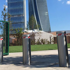 image semiautomatic stainless steel bollards positioned at the entrance of residential area to prevent unauthorized intrusion