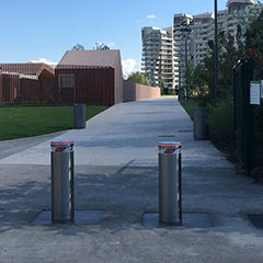 photo of semiautomatic high security bollards installed in a residential center to make safe the area