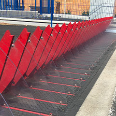 tyre killer barrier image with raised spikes mounted to prevent the passage of unauthorized vehicles